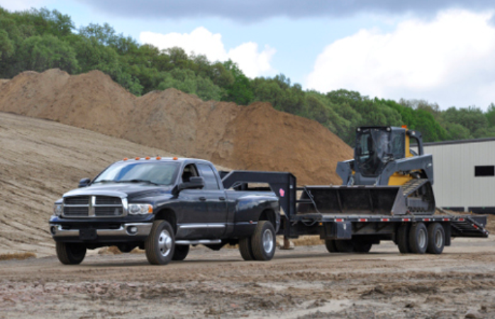 Truck With Gooseneck Hitch and Trailer