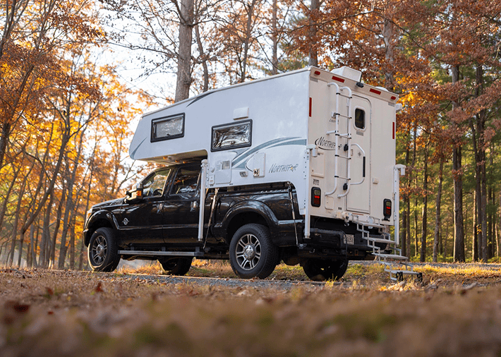 truck camper fall forest