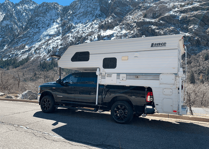 truck camper snowy mountains